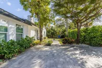 Elegant Kitchen and Outdoor Zen Shower - Cozy Coastal Haven