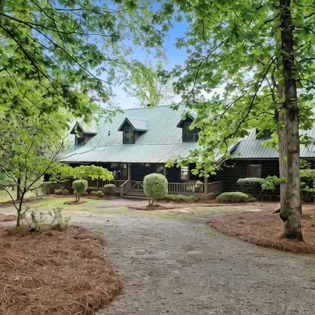Cabin on 35 acres w/private lake for fishing, fenced yard, hot tub, pool table