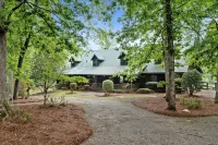 Cabin on 35 acres w/private lake for fishing, fenced yard, hot tub, pool table