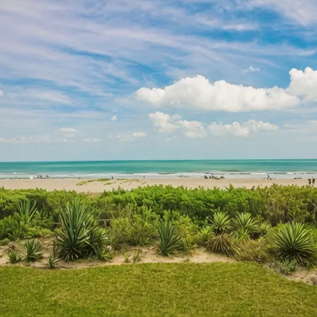 Beach Living at its Best!  Watch rocket launches from the balcony