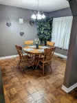 Cozy two-bedroom house with central heat and air. Close to downtown Ark City. - 2-Star