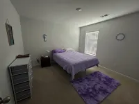 5 bedroom spacious home, with charcoal grill and seating. Peaceful neighborhood.