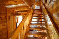 Cliffhanging Cabin over French Broad River between Hot Springs, NC and Gatlinburg Tn
