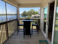 Fisherman's access and relaxation in a 2BR 2BA on River with Dock, Pet friendly!
