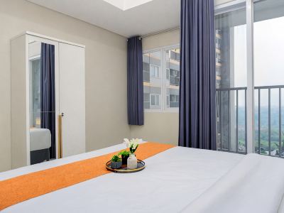Tranquil 1BR at Royal Sentul Park Apartment By Travelio