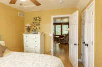 "Home Away From Home" nestled into five private acres on an all sports lake!