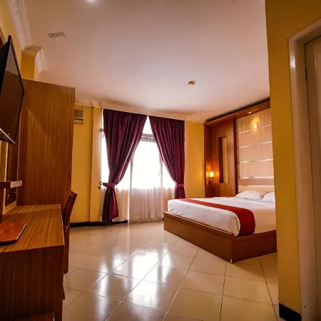 Kharisma Hotel Отели в г. Букиттинги