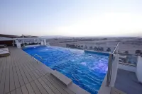 Carnelian Muscat - Airport Hotel - Pools