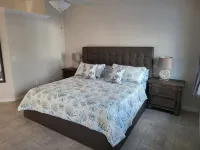 waterfront home, in a canal of the Caloosahatchee River with direct Gulf access. - Homestays