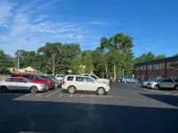 Posh Inn & Suites - parking