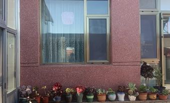 Fangdongmin Xingfu Xiang Huaer Yiyang Featured Homestay (Fulong Dongjie Branch)