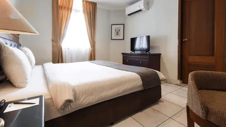 Travellers Suites Serviced Apartments Отели рядом со станцией Medan Train Station