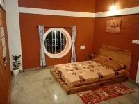 Beautifully designed Earthern home situated at the base of Skandagiri hills. Hotel a Chikkaballapura