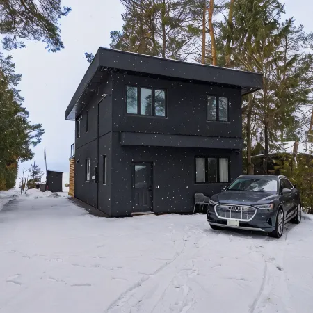 Luxury Waterfront Retreat with Sauna, EV Charger, Pizza Oven & Lake Views