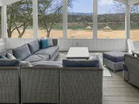 Waterfront, gorgeous sunsets, sandy beach, dogs allowed.