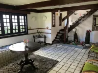 Cozy and Charming House with Pool and Gardens in a Beachfront Condominium!