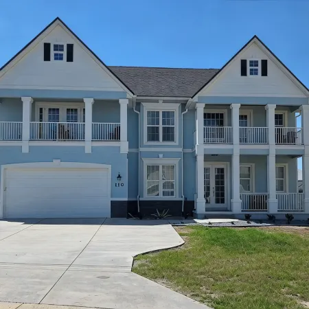 Beautiful two-story single family beach home with a private pool and ocean views