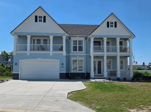 Beautiful two-story single family beach home with a private pool and ocean views