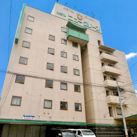 Hotel New Green Отели в г. Муцу