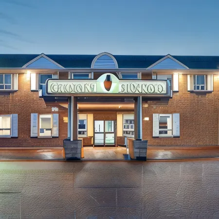 Guest House Inn & Suites Отели в г. Эдсон