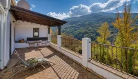 Casa Rural Arroyo de la Greda فنادق في Guejar Sierra