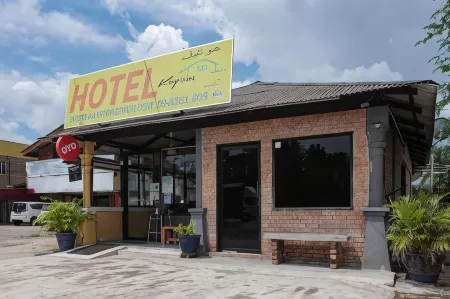 Hotel O Kay Inn Kerteh Отели рядом с достопримечательностью «Pantai Muara Sungai Kerteh»