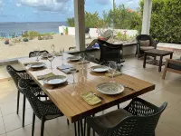 Beautiful oceanfront villa with beach and great house reef