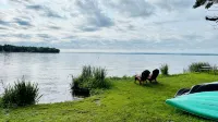 Experience the Charm of a Rustic Lakefront Cottage, Perfect for Year-Round Fun!