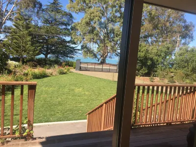 Self contained unit. By the beach and golf course  only 2.2 kms to town centre Hotels in 