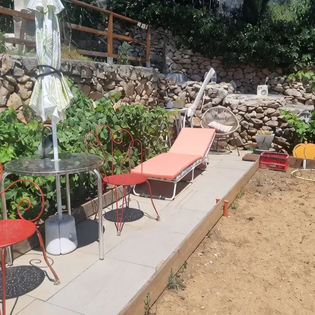 Top of villa, terraces, swimming pool at Mont St Clair, pétanque court with sea view