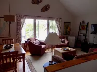 Beautifully appointed lake-view cottage with dock access