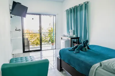 Ocean's Breeze Apartment and Rooms Hotel di 