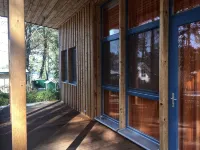 beautiful wooden house with exclusive furnishings and panoramic windows on Schwielowsee - balcony