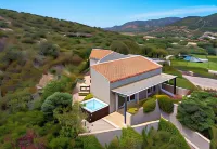 Baia Chia Laguna Resort, Curio Collection by Hilton