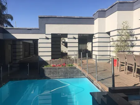 Orchids Lodge Отели в г. Сэндтон