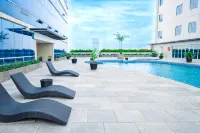 Cozy Living Studio at The Square Surabaya Apartment By Travelio