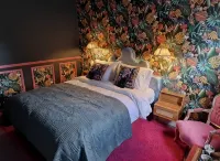 The MAD Hatter's Guestrooms