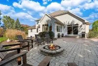 Huge home with theater, hot tub, golf cart, and just minutes from Lambeau Field!