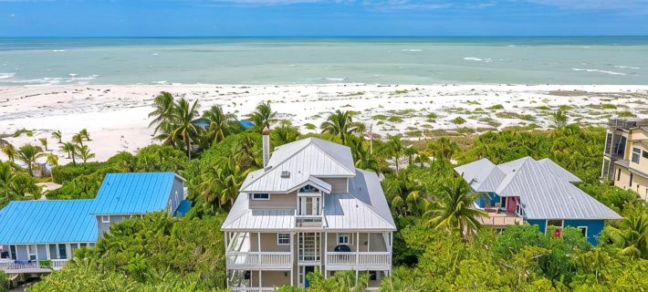 BEACHFRONT, HEATED POOL, KAYAKS/SUP, LANAI W/ GULF VIEWS, 85' DOCK, 2 GOLF CARTS Hotels in Captiva