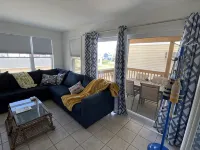 One mile to the beach!  2 br condo with deck, A/C, full kitchen, washer, dryer - Gym
