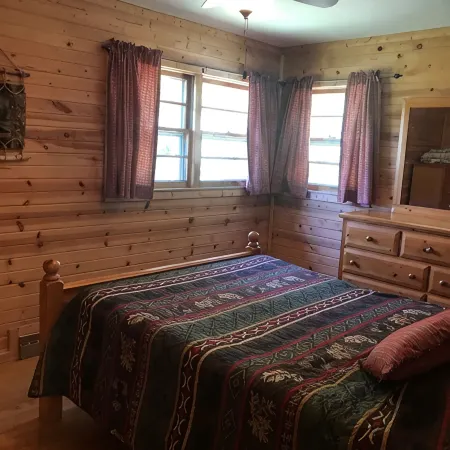 Private Lake House on 16 +/-  wooded acres, 80 + acre lake, 55 foot deep!!