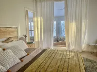 Osseo Lake Lodge  Unique Octagon Home with Sunset Views & Private Waterfront - 4-Star
