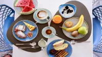ルナ ミノイカ スイーツ & アパートメンツ - 朝食