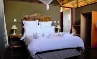 Lion Roars Lodge Hoteles cerca de Thebe River Camping