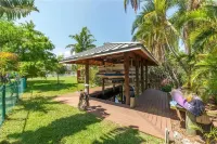 Tropical Oasis with Lazy River Pool and Outdoor Kitchen - Exquisite Retreat Hotels near Our Lady of Light Catholic