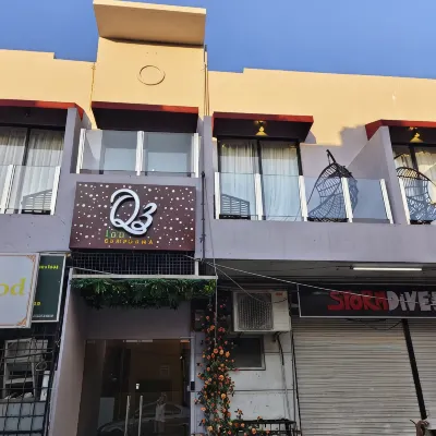 Q3 INN Hotels near Scuba Junkie