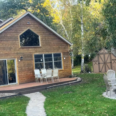 Spacious Summer Escape: Private Backyard, Dock & Fire Pit, Channel Waterfront