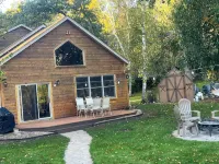 Spacious Summer Escape: Private Backyard, Dock & Fire Pit, Channel Waterfront