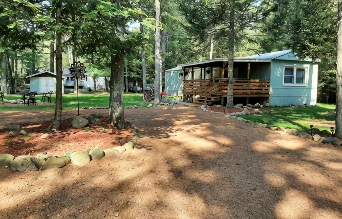 Cozy nestled in quiet neighborhood. On snowmobile and ATV trail.