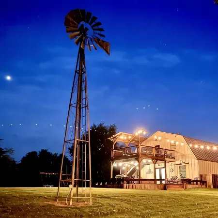 HGTV’s “BARNDOMINIUM” 16 Acres w/ Lake, Outdoor Kitchen, Decks & Playground